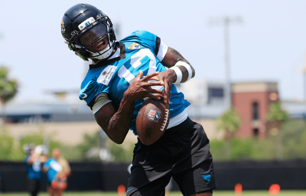 Jacksonville Jaguars wide receiver Travis Hunter (12) can't haul in a reception during the first organized team activity at Miller Electric Center Monday, May 19, 2025 in Jacksonville, Fla.