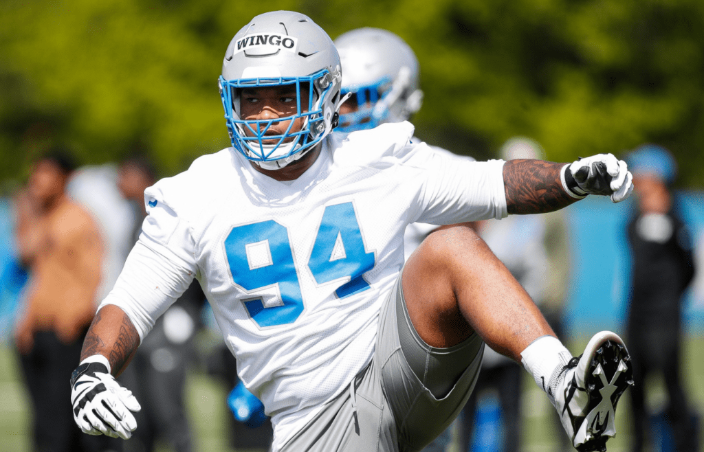 Detroit Lions defensive lineman Mekhi Wingo (94) arms up during rookie minicamp at Detroit Lions headquarters and practice facility in Allen Park on Friday, May 10, 2024