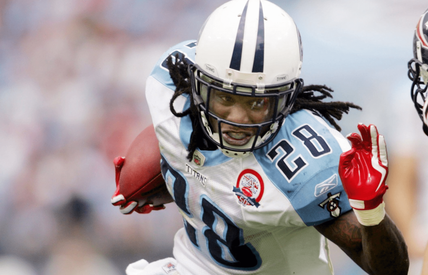 Tennessee Titans running back Chris Johnson (28) runs for good yardages against the Houston Texans at LP Field in Nashville on Sept. 20, 2009. The Titans lost their home opener 34-31.