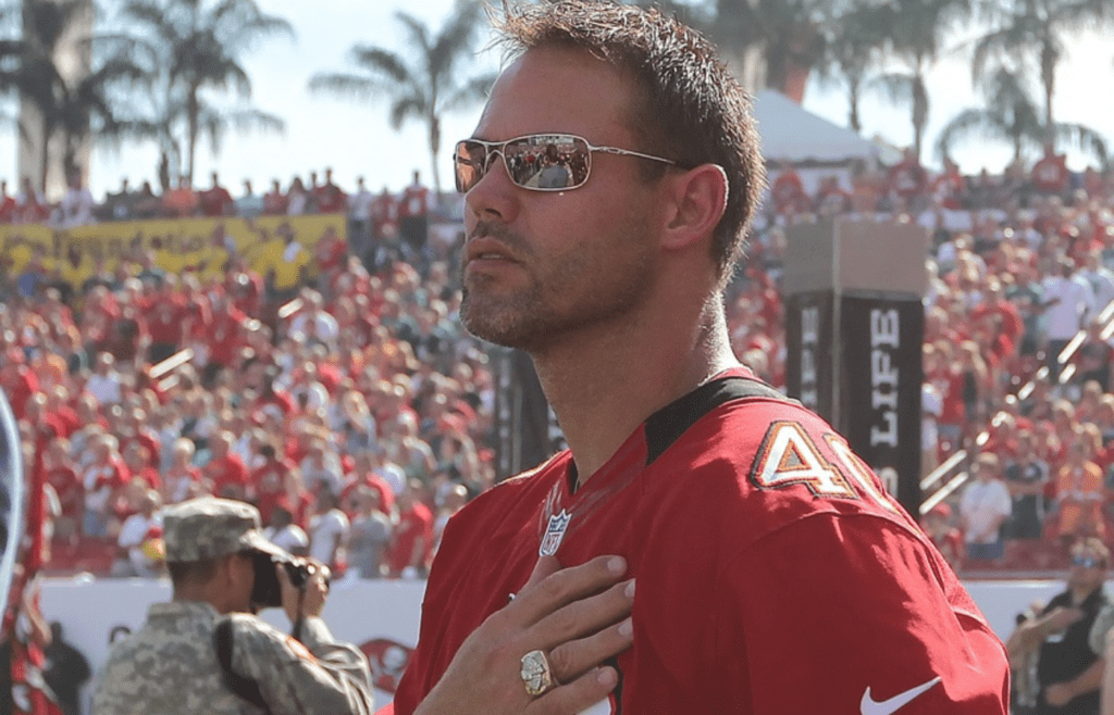 December 9, 2012; Tampa, FL, USA; Tampa Bay Buccaneers former full back Mike Alstott stands during the national anthem against the Philadelphia Eagles at Raymond James Stadium. Former players of the 2002 super bowl championship team came back to celebrate their 10th anniversary Mandatory Credit: Kim Klement-Imagn Images