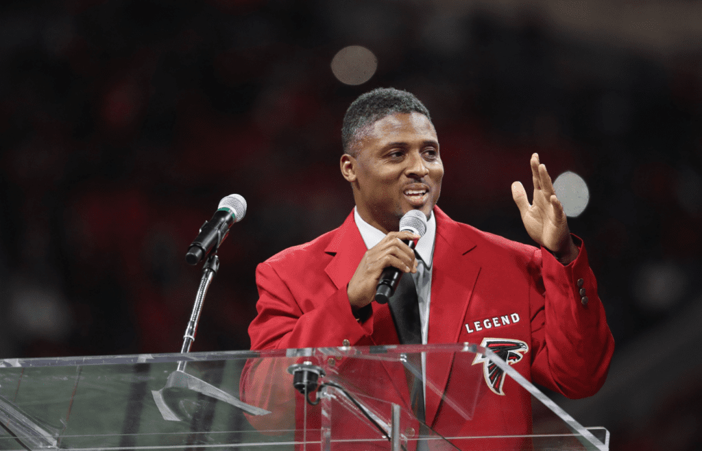 Dec 7, 2017; Atlanta, GA, USA; Atlanta Falcons former running back Warrick Dunn speaks as he was honored at half time during their game against the New Orleans Saints at Mercedes-Benz Stadium. Mandatory Credit: Jason Getz-Imagn Images