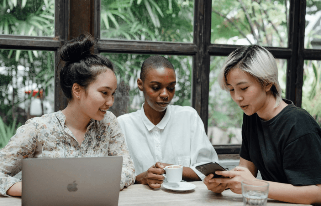 A friend group chatting excitedly