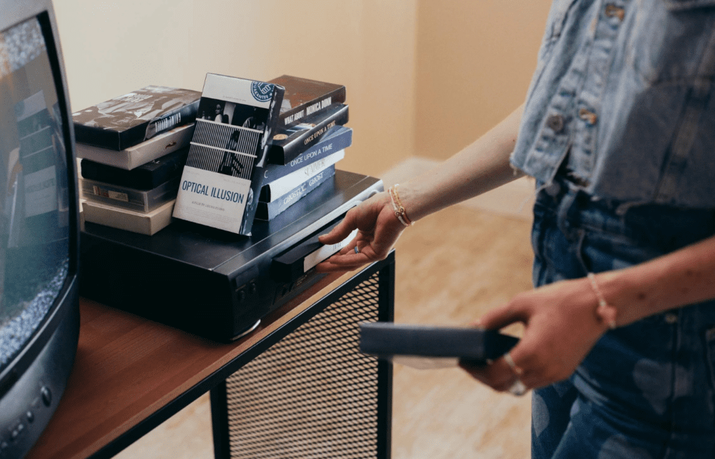 A VCR with a VHS tape halfway ejected