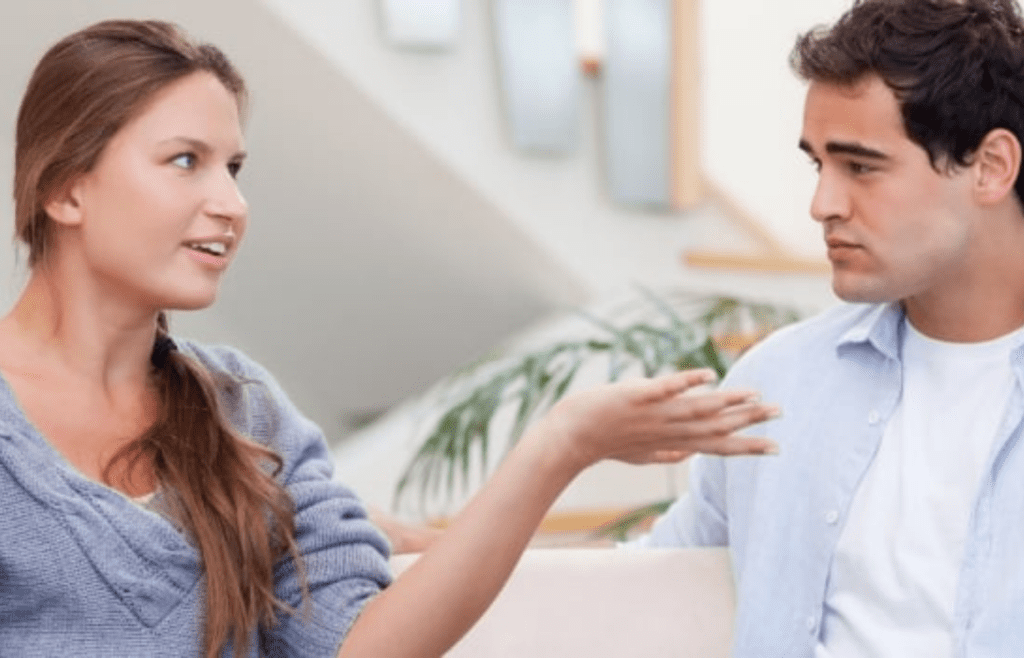 A person nitpicking while another looks frustrated