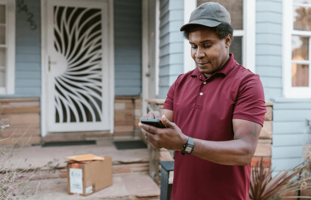 A person checking their phone mid-conversation