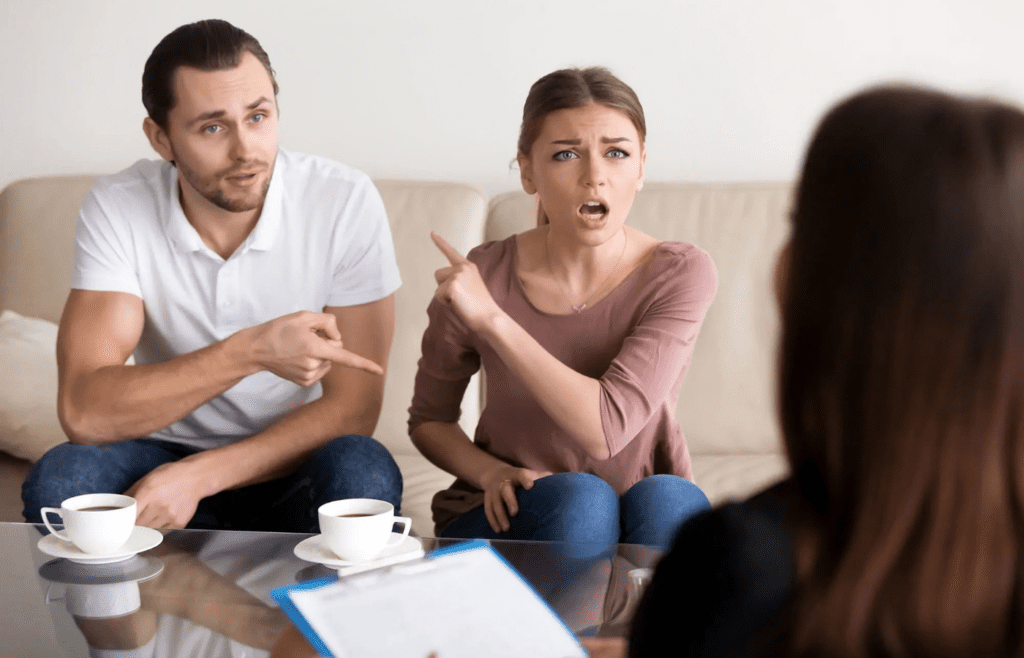 A person looking confused while someone else insists they’re wrong