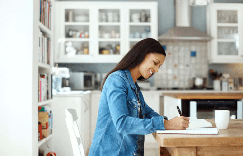 A printed bank or utility statement on a kitchen counter