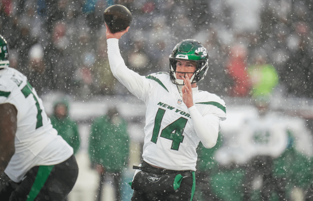 Jan 7, 2024; Foxborough, Massachusetts, USA; New York Jets quarterback Trevor Siemian (14) throws a pass against the New England Patriots in the second half at Gillette Stadium. Mandatory Credit: David Butler II-Imagn Images