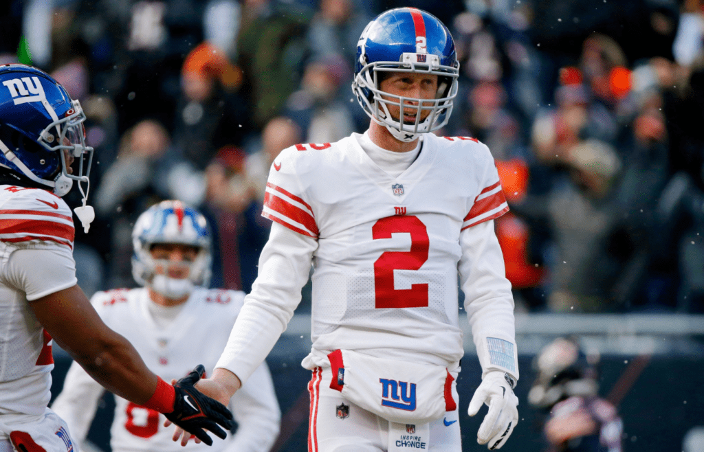 Jan 2, 2022; Chicago, Illinois, USA; New York Giants quarterback Mike Glennon (2) reacts after turning over the ball against the Chicago Bears on a fumble during the first half at Soldier Field. Mandatory Credit: Jon Durr-Imagn Images