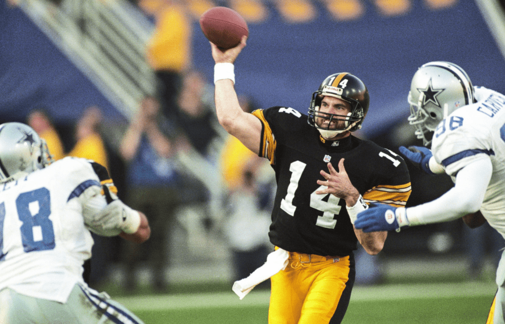 Jan 28, 1996; Tempe, AZ, USA; FILE PHOTO; Pittsburgh Steelers quarterback Neil O'Donnell (14) looks to throw against Dallas Cowboys linebacker Godfrey Myles (98) during Super Bowl XXX at Sun Devil Stadium. The Cowboys defeated the Steelers 27-17. Mandatory Credit: Rob Schumacher/The Arizona Republic-Imagn Images