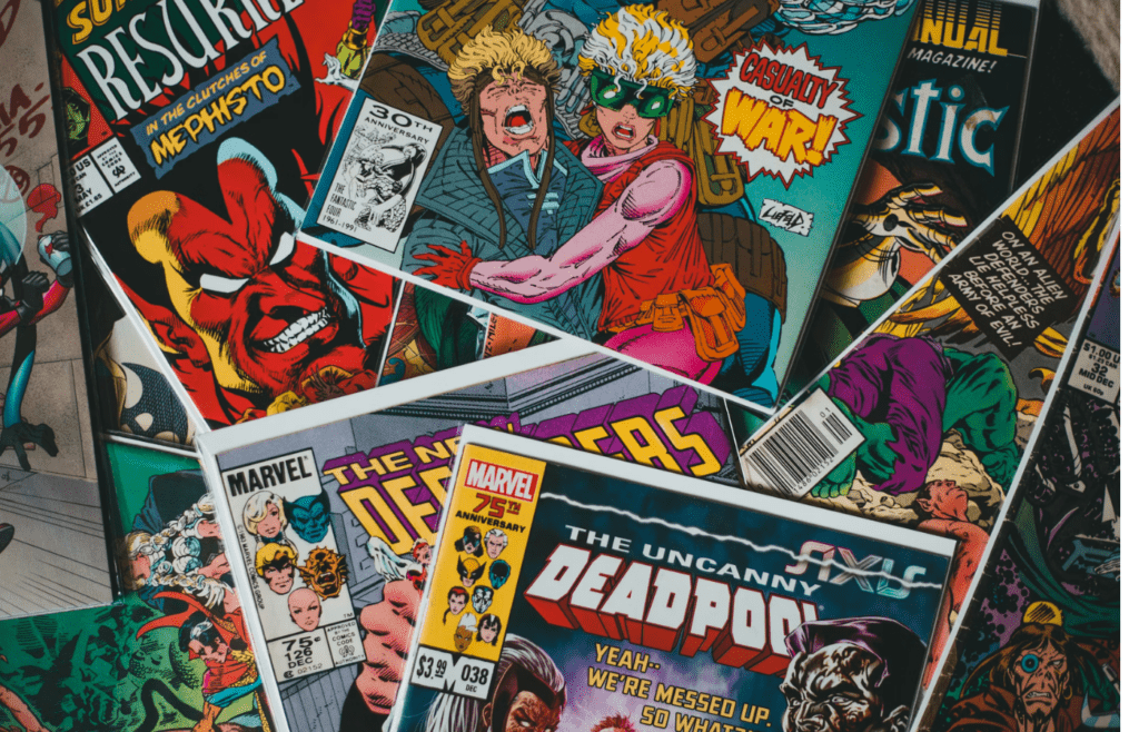 A stack of VHS tapes with action-packed cartoon covers