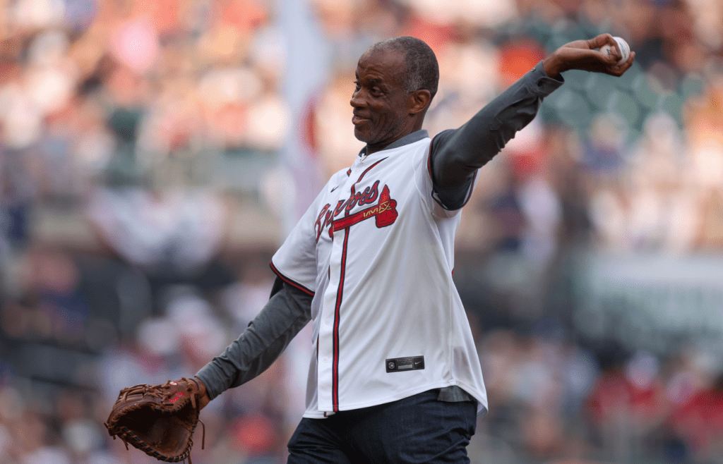 Apr 4, 2025; Atlanta, Georgia, USA; Former Atlanta Braves first baseman Fred McGriff (27) throws out the ceremonial first pitch before a game against the Miami Marlins at Truist Park. Mandatory Credit: Brett Davis-Imagn Images