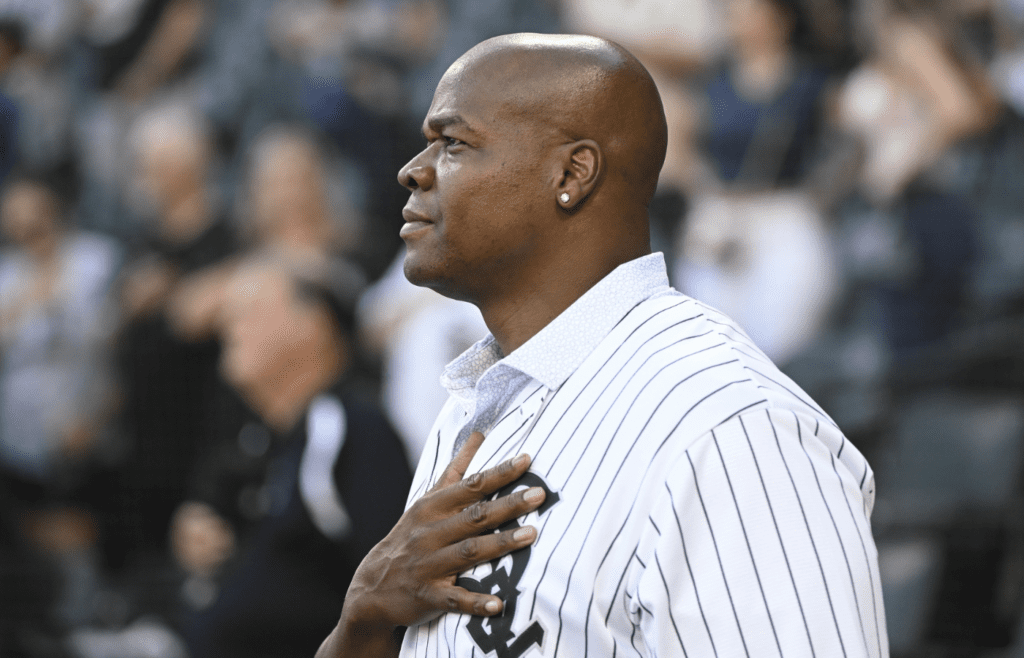 Aug 31, 2024; Chicago, Illinois, USA; Former Chicago White Sox player Frank Thomas during the national anthem before the team’s game against the New York Mets. He was there to throw out a ceremonial first pitch. at Guaranteed Rate Field. Mandatory Credit: Matt Marton-Imagn Images