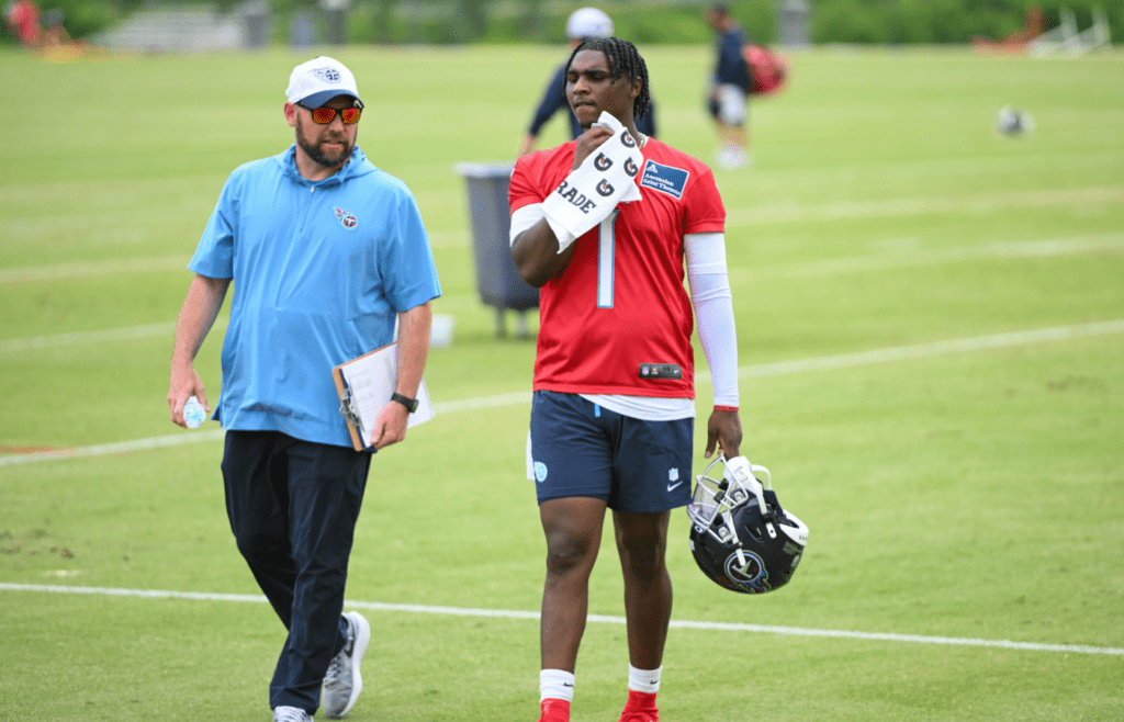 May 10, 2025; Nashville, TN, USA; Tennessee Titans quarterback Cam Ward (1) walks of the field after finish first day of rookie mini camp at Saint Thomas Sports Park. Mandatory Credit: Steve Roberts-Imagn Images