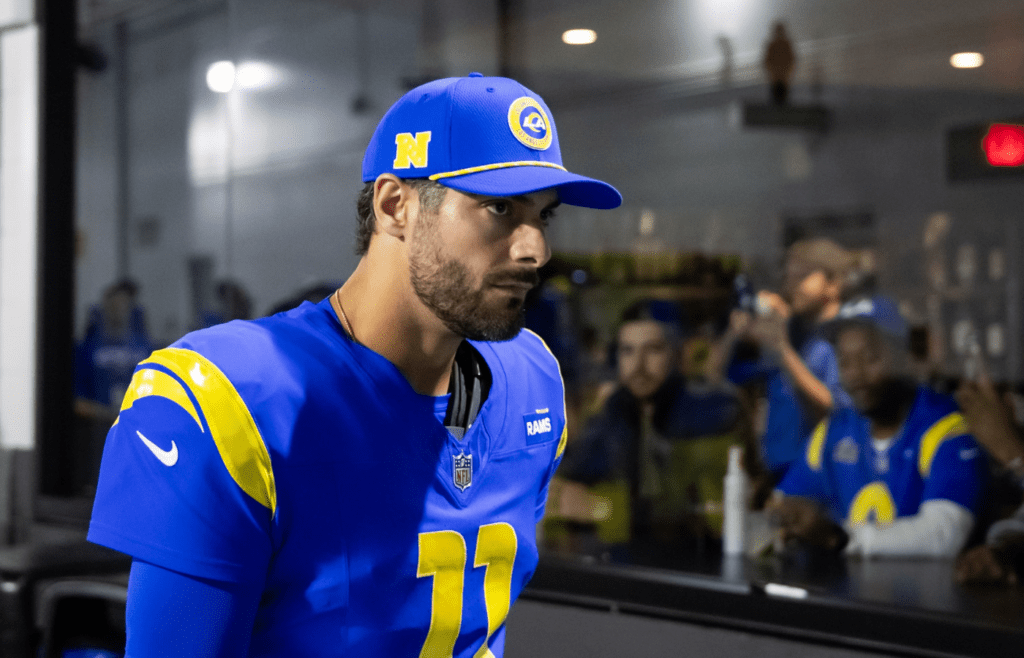 Jan 13, 2025; Glendale, AZ, USA; Los Angeles Rams quarterback Jimmy Garoppolo (11) against the Minnesota Vikings during an NFC wild card game at State Farm Stadium. Mandatory Credit: Mark J. Rebilas-Imagn Images