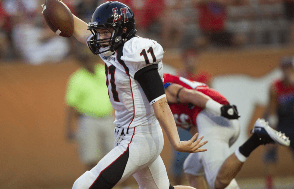Lake Travis quarterback Baker Mayfield runs for a touchdown in the first quarter against Westlake at Royal-Memorial Stadium on Saturday, August 27, 2011