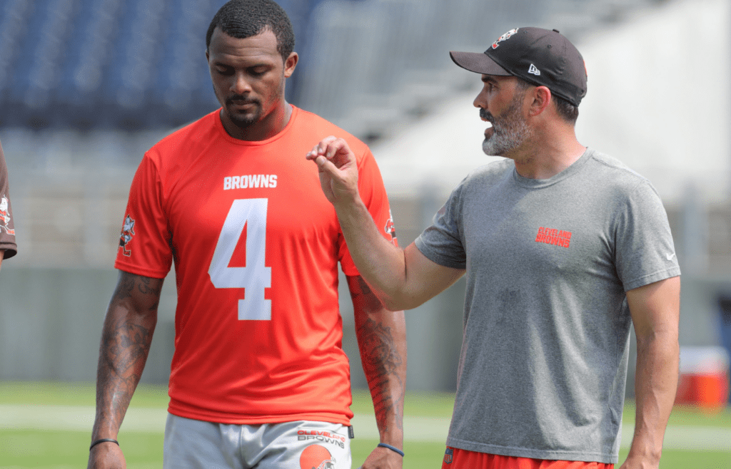 Browns quarterback Deshaun Watson talks with coach Kevin Stefanski after minicamp on Wednesday, June 15, 2022, in Canton.