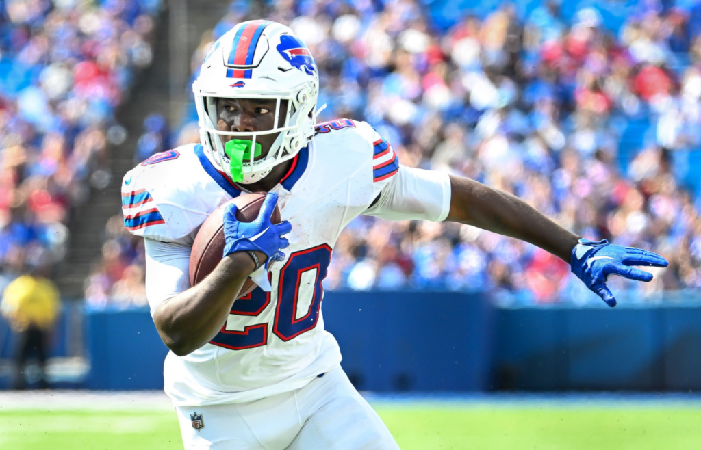 Aug 24, 2024; Orchard Park, New York, USA; Buffalo Bills running back Frank Gore Jr. (20) runs against the Carolina Panthers in the third quarter pre-season game at Highmark Stadium. Mandatory Credit: Mark Konezny-Imagn Images