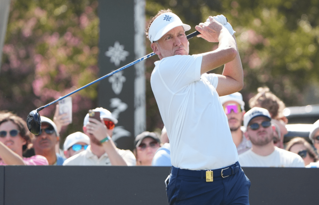 Sep 22, 2024; Carrolton, Texas, USA; Ian Poulter plays his shot from the tenth tee during the LIV Golf Dallas Team Championship Finals at Maridoe Golf Club. Mandatory Credit: Jim Cowsert-Imagn Images