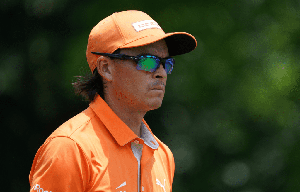 May 25, 2025; Fort Worth, Texas, USA; Rickie Fowler walks down the sixth fairway during the final round of the Charles Schwab Challenge golf tournament. Mandatory Credit: Raymond Carlin III-Imagn Images