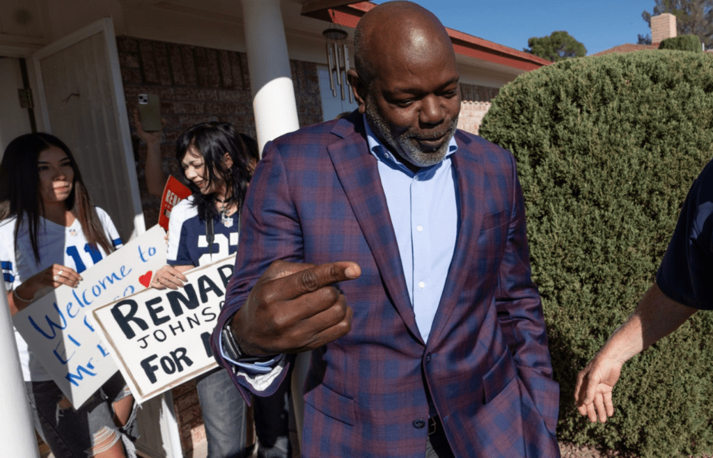 Legendary NFL running back Emmitt Smith greets fans as he campaigns with El Paso mayoral candidate Renard Johnson on Oct. 21, 2024, during the first day of early voting for the 2024 presidential election in El Paso, Texas.
