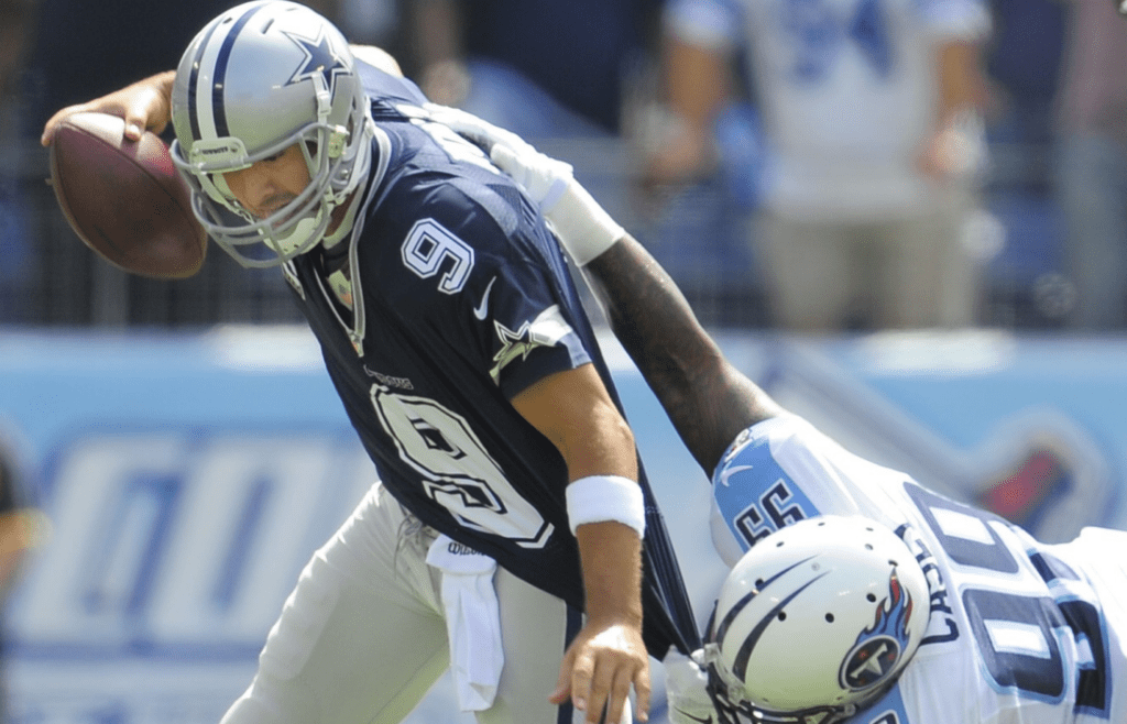 Tennessee Titans defensive end Jurrell Casey (99) is set to sack Dallas Cowboys quarterback Tony Romo (9) at LP Field in Nashville on Sept. 14, 2014. The Titans lost their home opener 26-10.