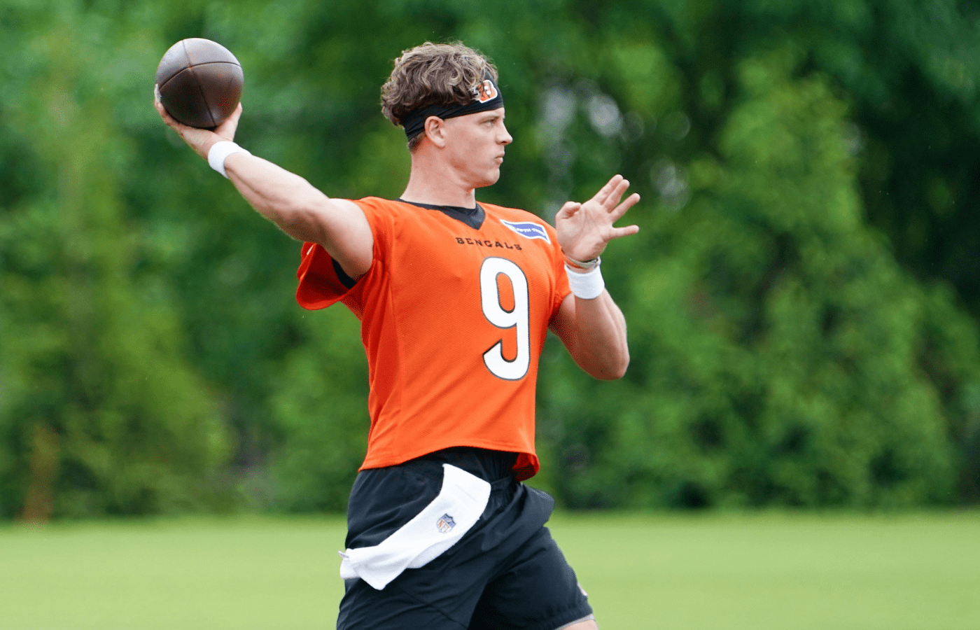Cincinnati Bengals quarterback Joe Burrow (9) runs through drills during practice, Tuesday, May 13, 2025, at Kettering Health Practice Fields in Downtown Cincinnati.