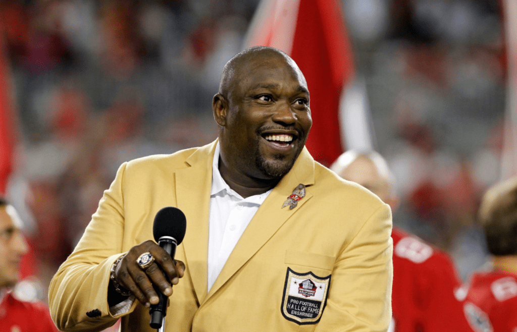 Nov 11, 2013; Tampa, FL, USA; Tampa Bay Buccaneers hall of famer Warren Sapp talks as he is inducted into the Ring of Honor at halftime against the Miami Dolphins at Raymond James Stadium. Mandatory Credit: Kim Klement-Imagn Images