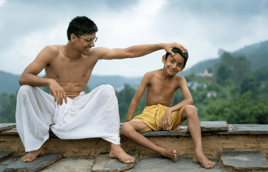 One person laughing while another looks hurt