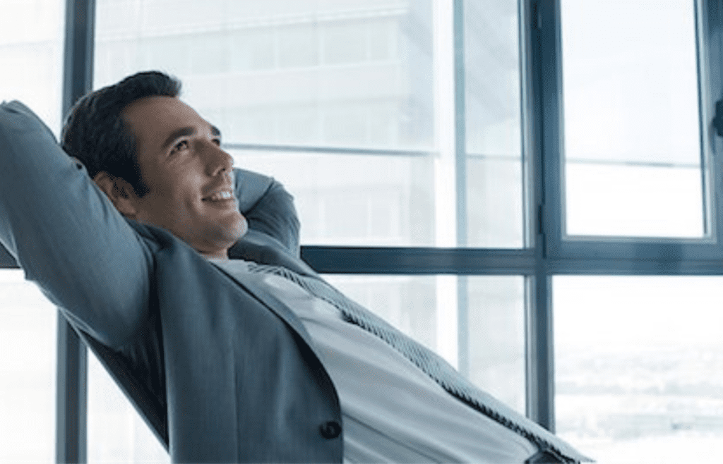 A person with a smug expression in a business setting