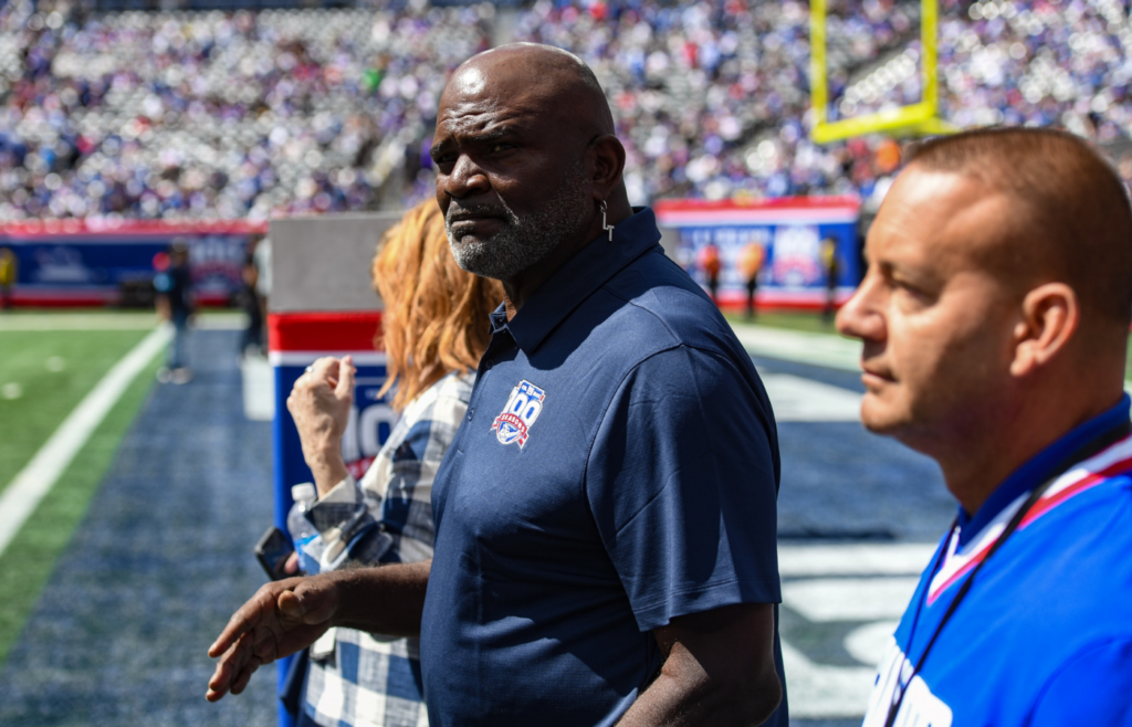 Sep 8, 2024; East Rutherford, New Jersey, USA; New York Giants legend Lawrence Taylor enters the field before a game between the New York Giants and the Minnesota Vikings at MetLife Stadium. Mandatory Credit: John Jones-Imagn Images