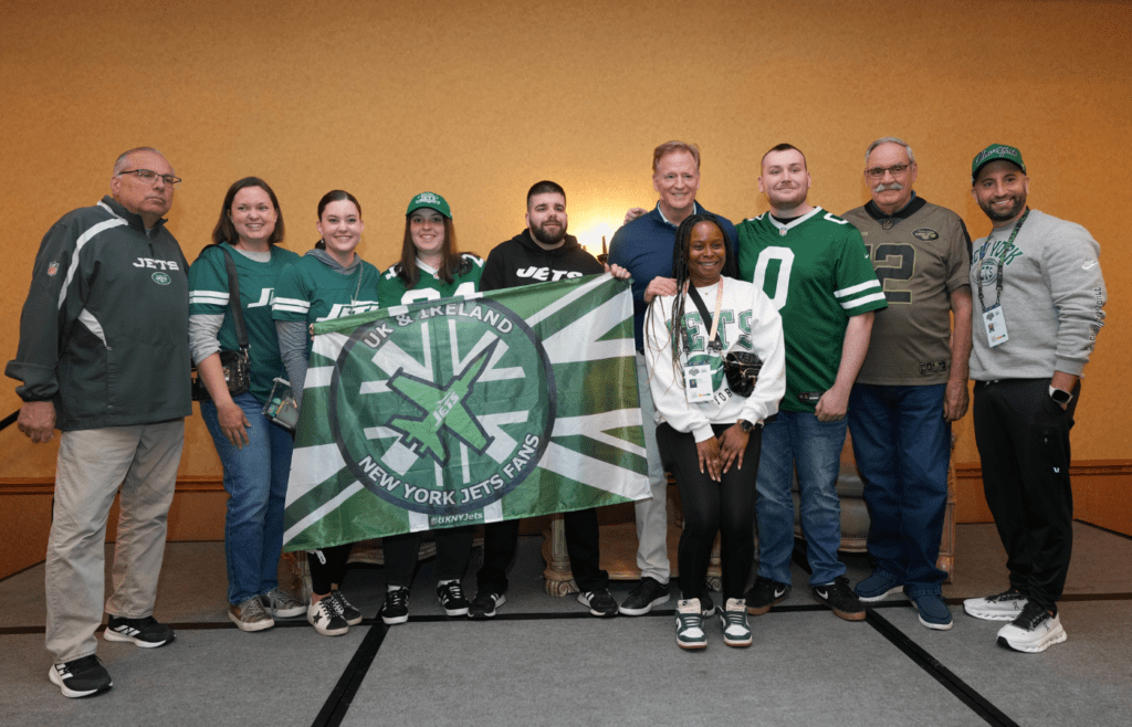 Apr 23, 2025; Green Bay, WI, USA; New York Jets fans pose with NFL commissioner Roger Goodell at the NFL Draft Fan Forum at the Tundra Lodge. Mandatory Credit: Kirby Lee-Imagn Images