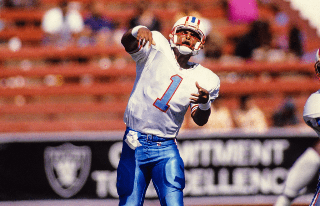 Aug 29, 1992; Los Angeles, CA, USA: FILE PHOTO; Houston Oilers quarterback Warren Moon (1) throws the ball during a preseason game against the Los Angeles Raiders at Los Angeles Memorial Coliseum. Mandatory Credit: Long Photography-USA TODAY NETWORK