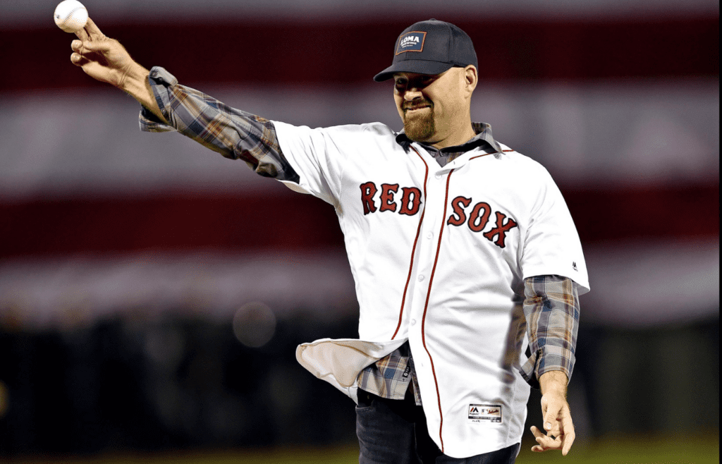 Oct 13, 2018; Boston, MA, USA; Boston Red Sox former player Kevin Youkilis throws the first pitch before game one of the 2018 ALCS playoff baseball series between the Houston Astros and Boston Red Sox at Fenway Park. Mandatory Credit: Bob DeChiara-Imagn Images
