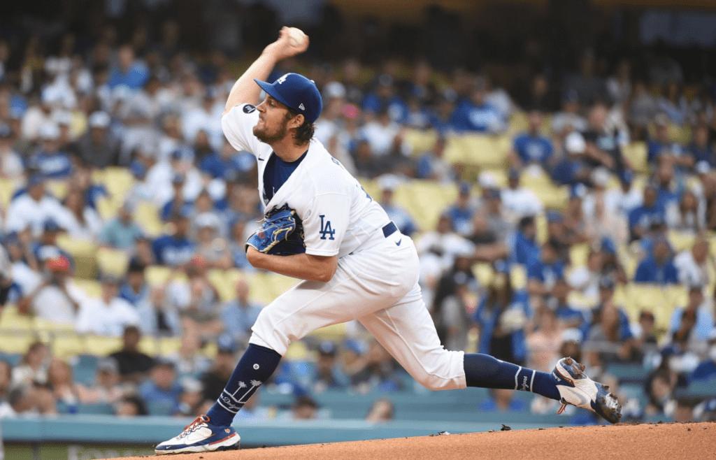 Jun 28, 2021; Los Angeles, California, USA; Los Angeles Dodgers starting pitcher Trevor Bauer (27) pitches against the San Francisco Giants in the first inning at Dodger Stadium. Mandatory Credit: Richard Mackson-Imagn Images