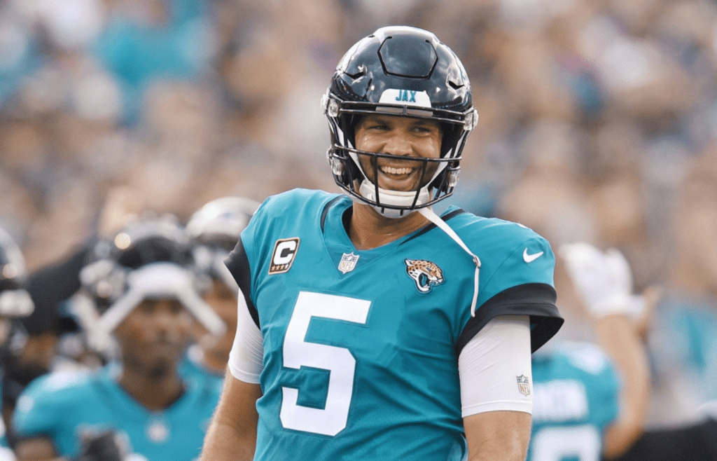 Jacksonville Jaguars quarterback Blake Bortles (5) is all smiles after Jaguars wide receiver Keelan Cole caught a pass for a touchdown during late first quarter action, when the Jaguars hosted the New England Patriots at TIAA Bank Field on Sept. 16, 2018 in a rematch of the previous season's AFC Championship contenders.