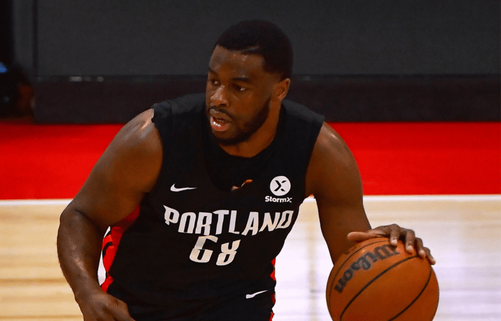 Aug 8, 2021; Las Vegas, Nevada, USA; Portland Trail Blazers guard Emmanuel Mudiay (58) dribbles the ball during an NBA Summer League game against the Charlotte Hornets at Cox Pavilion. Mandatory Credit: Stephen R. Sylvanie-Imagn Images