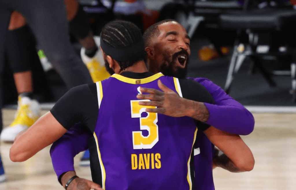 Sep 26, 2020; Lake Buena Vista, Florida, USA; Los Angeles Lakers forward Anthony Davis (3) celebrates with J.R. Smith after a three point basket against the Denver Nuggets during the fourth quarter in game five of the Western Conference Finals of the 2020 NBA Playoffs at AdventHealth Arena. Mandatory Credit: Kim Klement-Imagn Images
