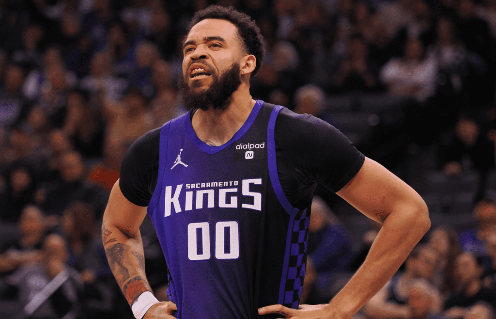 Feb 9, 2024; Sacramento, California, USA; Sacramento Kings center JaVale McGee (00) reacts to comments from the Denver Nuggets bench during the first quarter at Golden 1 Center. Mandatory Credit: Kelley L Cox-Imagn Images