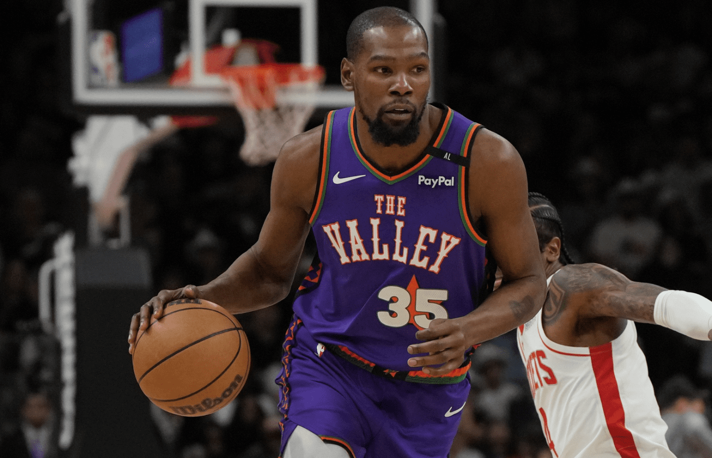 Mar 30, 2025; Phoenix, Arizona, USA; Phoenix Suns forward Kevin Durant (35) drives against the Houston Rockets in the first half at Footprint Center. Mandatory Credit: Rick Scuteri-Imagn Images