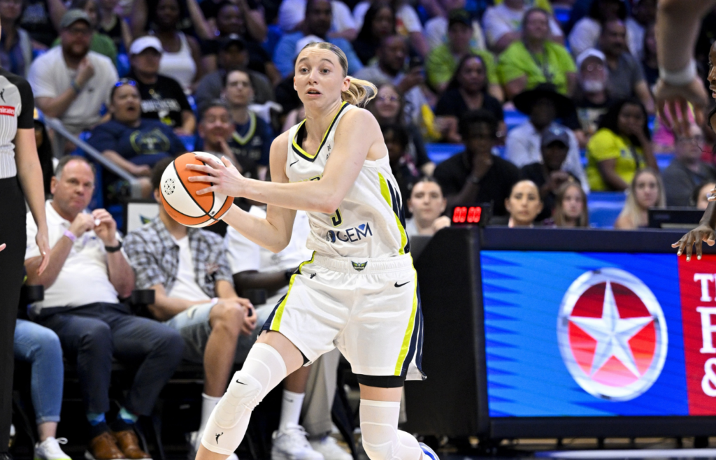 May 19, 2025; Arlington, Texas, USA; Dallas Wings guard Paige Bueckers (5) in action during the game between the Dallas Wings and the Seattle Storm at College Park Center. Mandatory Credit: Jerome Miron-Imagn Images