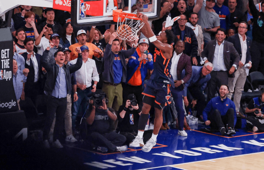 May 12, 2025; New York, New York, USA; New York Knicks forward OG Anunoby (8) dunks the ball as fans celebrate in the second half during game four of the second round for the 2025 NBA Playoffs against the Boston Celtics at Madison Square Garden. Mandatory Credit: Vincent Carchietta-Imagn Images