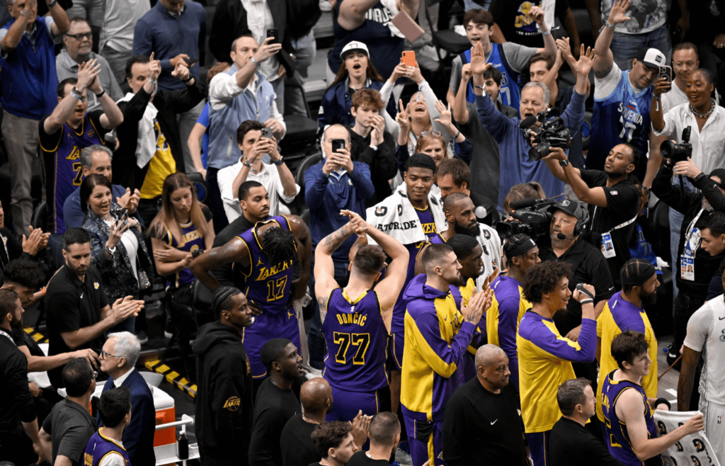 Apr 9, 2025; Dallas, Texas, USA; Los Angeles Lakers guard Luka Doncic (77) acknowledges the fans during the fourth quarter against the Dallas Mavericks at the American Airlines Center. Mandatory Credit: Jerome Miron-Imagn Images