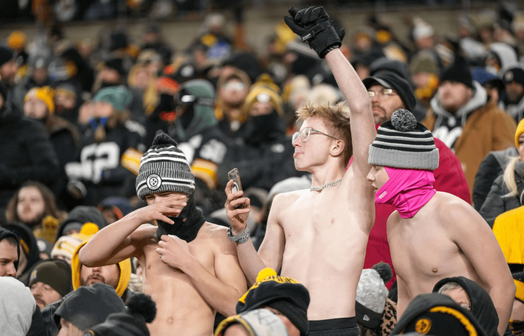 Jan 4, 2025; Pittsburgh, Pennsylvania, USA; Pittsburgh Steelers fans cheer for the video board in the fourth quarter against the Cincinnati Bengals at Acrisure Stadium. The Bengals won 19-17 to finish the regular season at 9-8. Mandatory Credit: Sam Greene/USA TODAY Network via Imagn Images