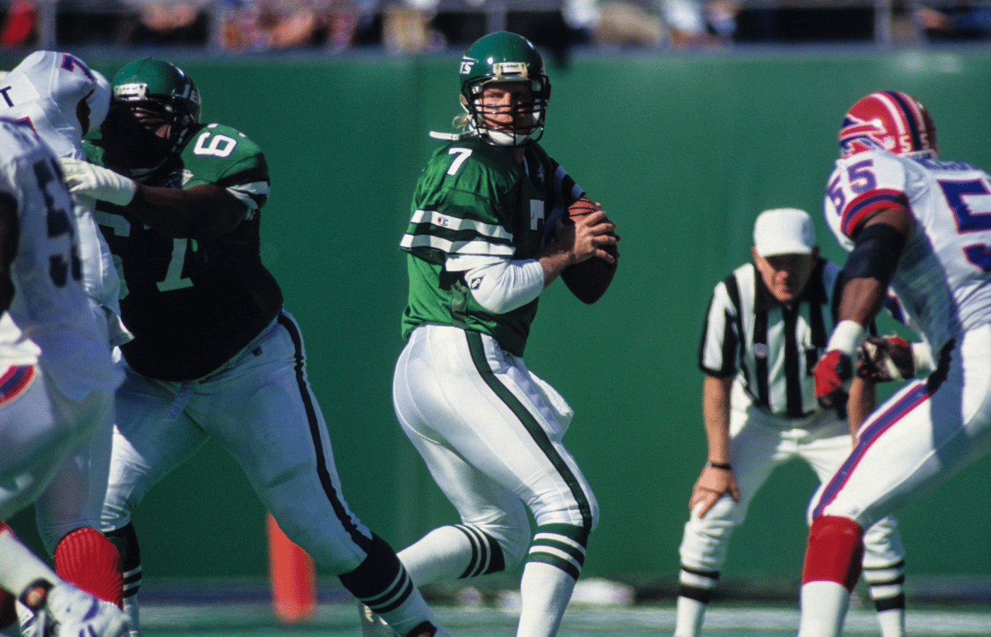 New York Jets quarterback Boomer Esiason (7) in action against the Buffalo Bills at Giants Stadium.