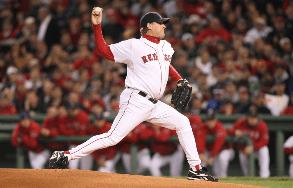 Oct 25, 2007; Boston, MA, USA; Boston Red Sox starting pitcher (38) Curt Schilling delivers a pitch against the Colorado Rockies during game 2 of the 2007 World Series at Fenway Park. Mandatory Credit: Tom Szczerbowski-Imagn Images