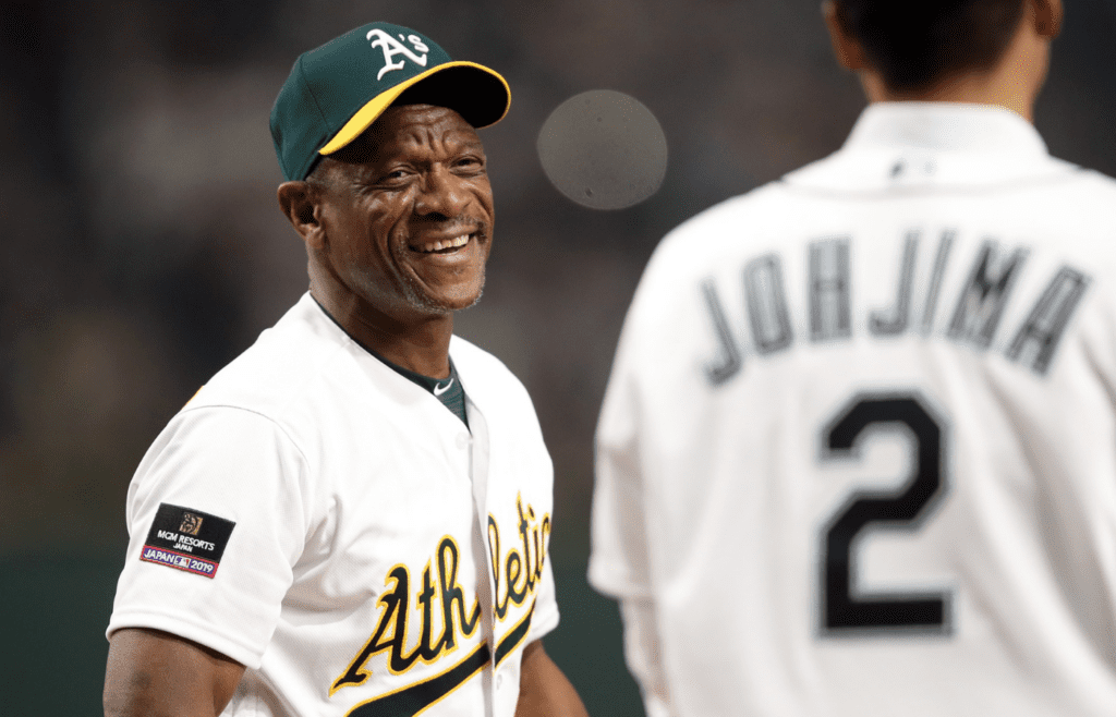 Mar 20, 2019; Tokyo, JPN; Oakland Athletics former left fielder Rickey Henderson smiles while participating in the Ceremonial First Pitch before the game between the Oakland Athletics and the Seattle Mariners at Tokyo Dome. Mandatory Credit: Darren Yamashita-Imagn Images