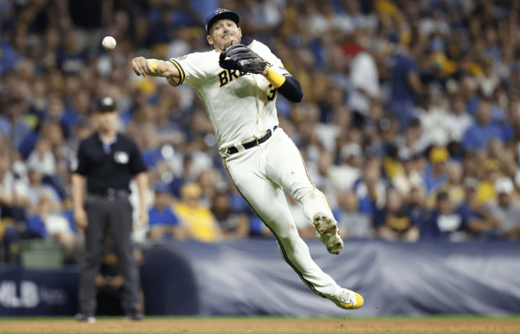 Oct 4, 2023; Milwaukee, Wisconsin, USA; Milwaukee Brewers third baseman Josh Donaldson (3) throws to first in the seventh inning against the Arizona Diamondbacks during game two of the Wildcard series for the 2023 MLB playoffs at American Family Field. Mandatory Credit: Kamil Krzaczynski-Imagn Images