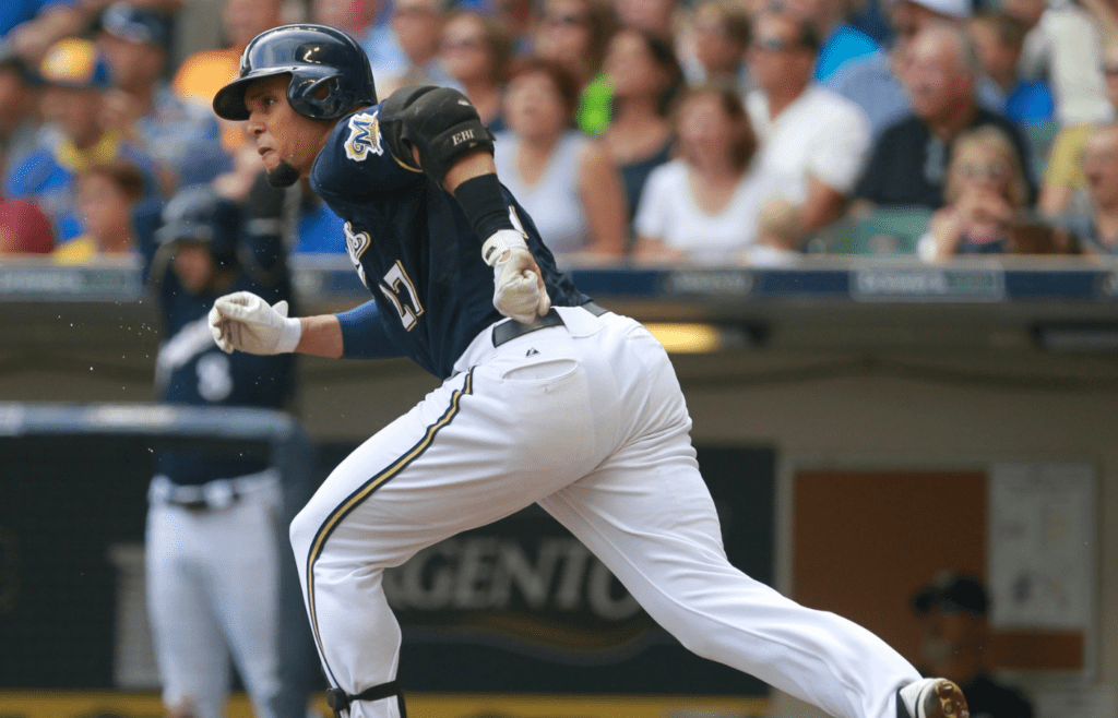 Milwaukee Brewers center fielder Carlos Gomez (27) watches his double during the second inning of their game against the Pittsburgh Pirates Sunday, August 24, 2014 at Miller Park in Milwaukee