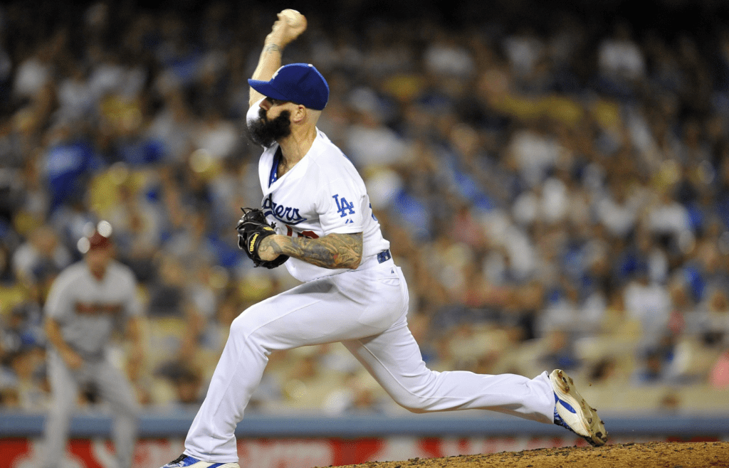 Los Angeles Dodgers relief pitcher Brian Wilson (00) pitches the eighth inning against the Arizona Diamondbacks at Dodger Stadium